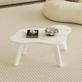 Table basse moderne en forme de nuage blanche avec pieds en bois massif
