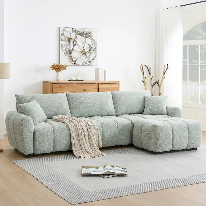 Canapé d'angle en tissu bouclé avec pouf mobile