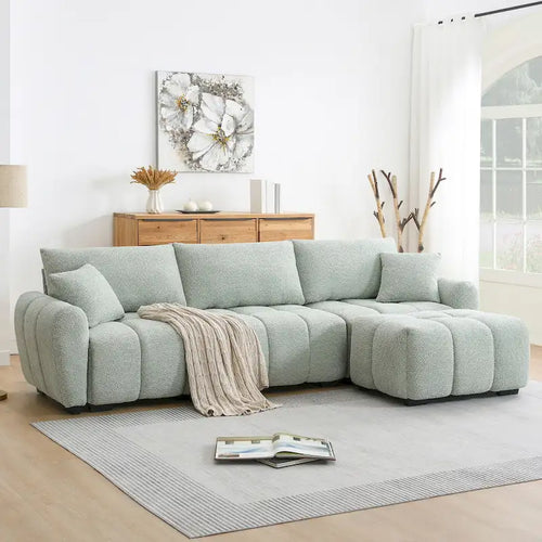 Canapé d'angle en tissu bouclé avec pouf mobile