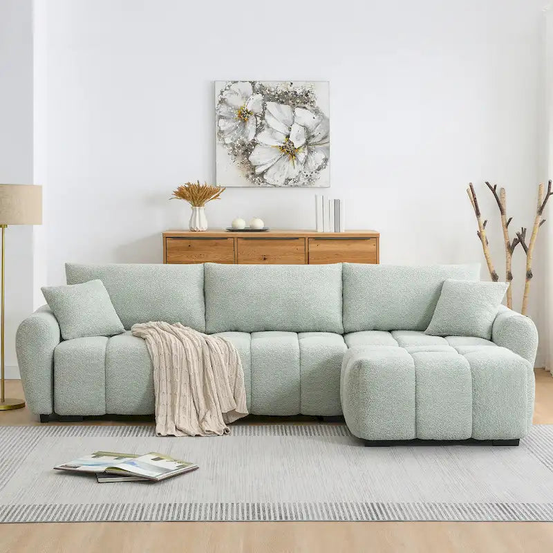 Canapé d'angle en tissu bouclé avec pouf mobile