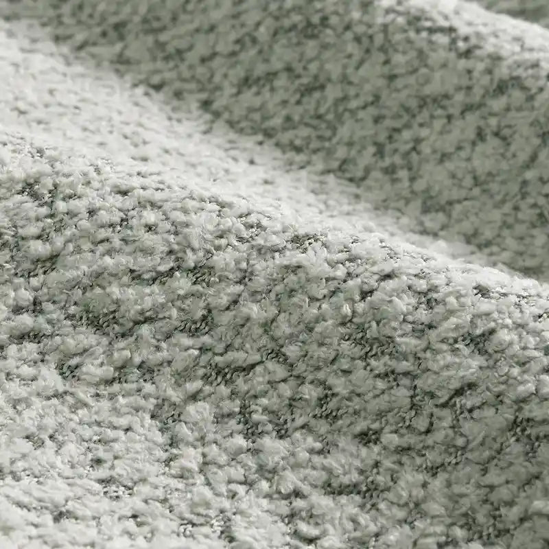 Canapé d'angle en tissu bouclé avec pouf mobile