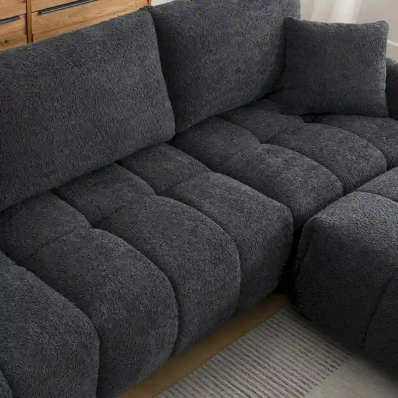 Canapé d'angle en tissu bouclé avec pouf mobile