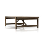 Grande table basse rectangulaire, structure en bois massif, pièce maîtresse du salon